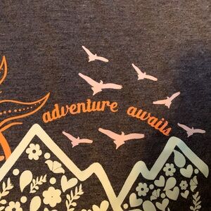 Ladies short sleeve shirt with saying “adventure awaits “. Like new condition